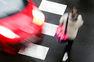 crosswalk of street city with people in dangerous situation