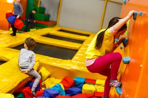 Children playing on a inflatable trampoline